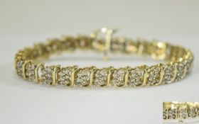 10 Carat Gold Diamond Cluster Bracelet, 4 carats diamond weight. Small bracelet with unusual links.