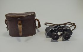 A Vintage French Pair of Field Binoculars, Marked Martini / Parls and Omega 8 x 28.