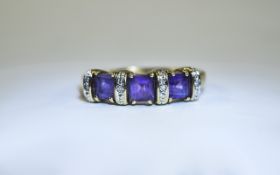 Ladies 9ct Gold Diamond and Amethyst Chanel Set Ring. The Three Amethysts of Good Colour with