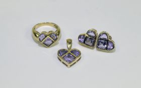 9ct Gold Amethyst Set comprising heart shaped earrings, pendent and ring.