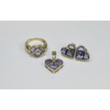 9ct Gold Amethyst Set comprising heart shaped earrings, pendent and ring.