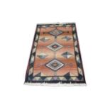 Rug with Woven Aztec Design Approx dimensions 70.