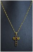 9 Carat Gold Pendant Cross Central Garnet, set between 2 citrines and a row of topaz.