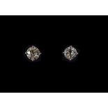 Fine Pair of Single Stone Diamond Earrings Set In Platinum and Marked 950.