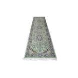 Large Wool Hallway Runner. Mint green ground with navy, taupe, cream and blue border.