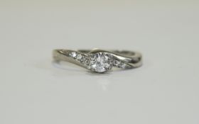 18 Carat Diamond Solitaire Ring Diamond shoulders featuring 3 small diamonds to each side.