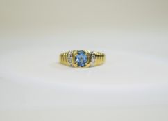 10ct Yellow Gold Set Single Stone Topaz and Diamond Ring, The Faceted Topaz with Diamond Shoulders.
