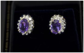 Gold Diamond & Amethyst Stud earrings. C