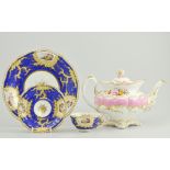 Two 19th Century shallow bowls, with hand painted vignettes with four matching cups and saucers,