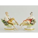 Pair of Italian figures, boy with fruit basket, girl with flower basket.