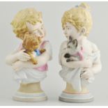 Pair of Austrian biscuit glazed half-length figures, of a boy with his dog and a girl with her cat,