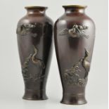 Pair of Japanese bronze ovoid vases, with overlaid cranes, height 34cm.