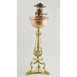 Victorian brass and copper table lamp, the column in triform design, with a centre reeded column,