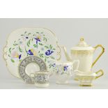 Set of six Wedgwood "Florentine" pattern coffee cans and saucers,
