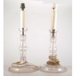 Near pair of Victorian glass table candlesticks, hollow stems, adapted as table lamps, 46cm overall.