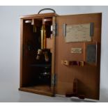 Brass and lacquered microscope, E Lietz Vetzlar and London, No. 122030, in wooden case of issue.