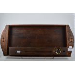 Rectangular oak tea tray, with walnut handles and a brass "Jumbo" spirit level,