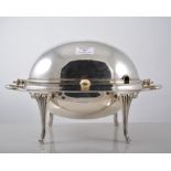 Silver plated revolving breakfast dish, reeded handles and legs,