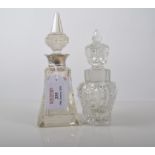 Cut glass scent bottle with a silver collar, pointed stopper,