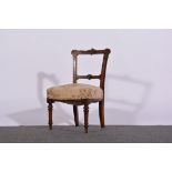 Victorian walnut child's single chair, with a carved bar back, floral seats, turned legs,