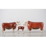 Beswick, "Champion of Champions", a Hereford Bull, Cow and calf, all gloss,