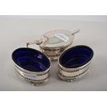 Silver three piece cruet, ISG Birmingham 1946, comprising oval mustard with spoon and two salts,