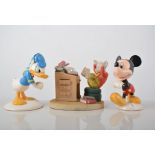 Five Royal Doulton figures from the Mickey Mouse collection, Daisy Duck, Pluto, Mickey Mouse,