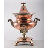 Victorian copper tea urn, campana shape with a domed lid, twin handles, 48cm.