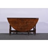 Joined oak table, oval top with two fall leaves, bobbin turned gate legs, 18th Century style,