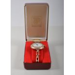 Gold-cased wristwatch, (damaged, no winding crown),