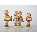 Hummel pottery figure of a Birthday cake, height 13cm, seven other Hummel pottery figures,
