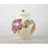 Moorcroft bulbous shaped lamp base, 'Anemone' design on an ivory coloured ground, 19cm with a shade.