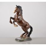 Beswick equestrian model of a rearing chestnut horse, No. 1014, 28cm.