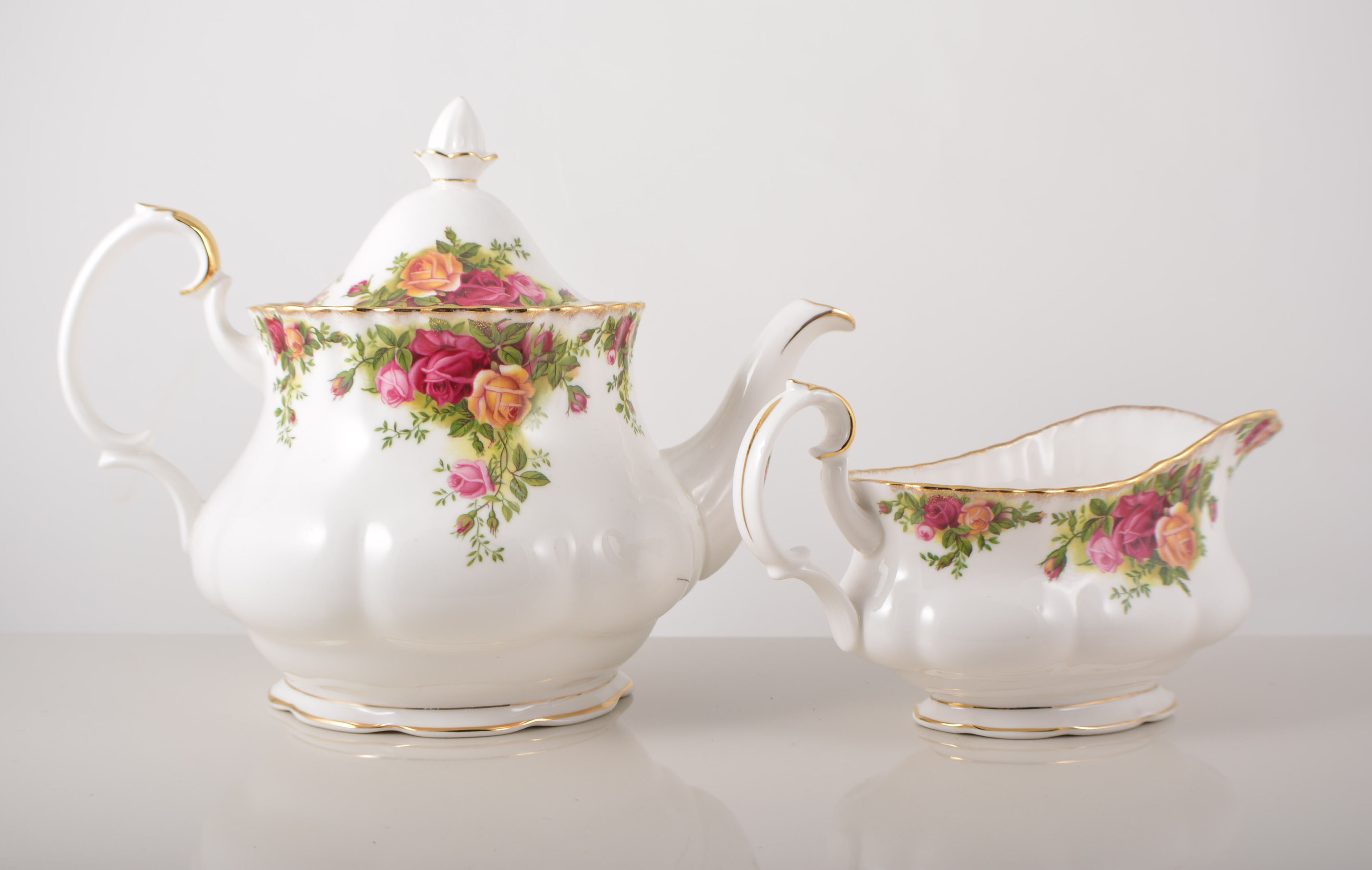 Royal Albert " Old Country Roses" tea/dinner service, comprising of one tea pot, six tea cups,