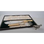 Set of Victorian silver plated fish servers, bright cut and engraved blades, cased,