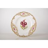 Pair of Minton dessert plates, hand painted with puce flowers and gilt highlights, 24cm,