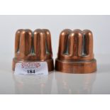 Pair of small Victorian copper moulds, height 5cms.