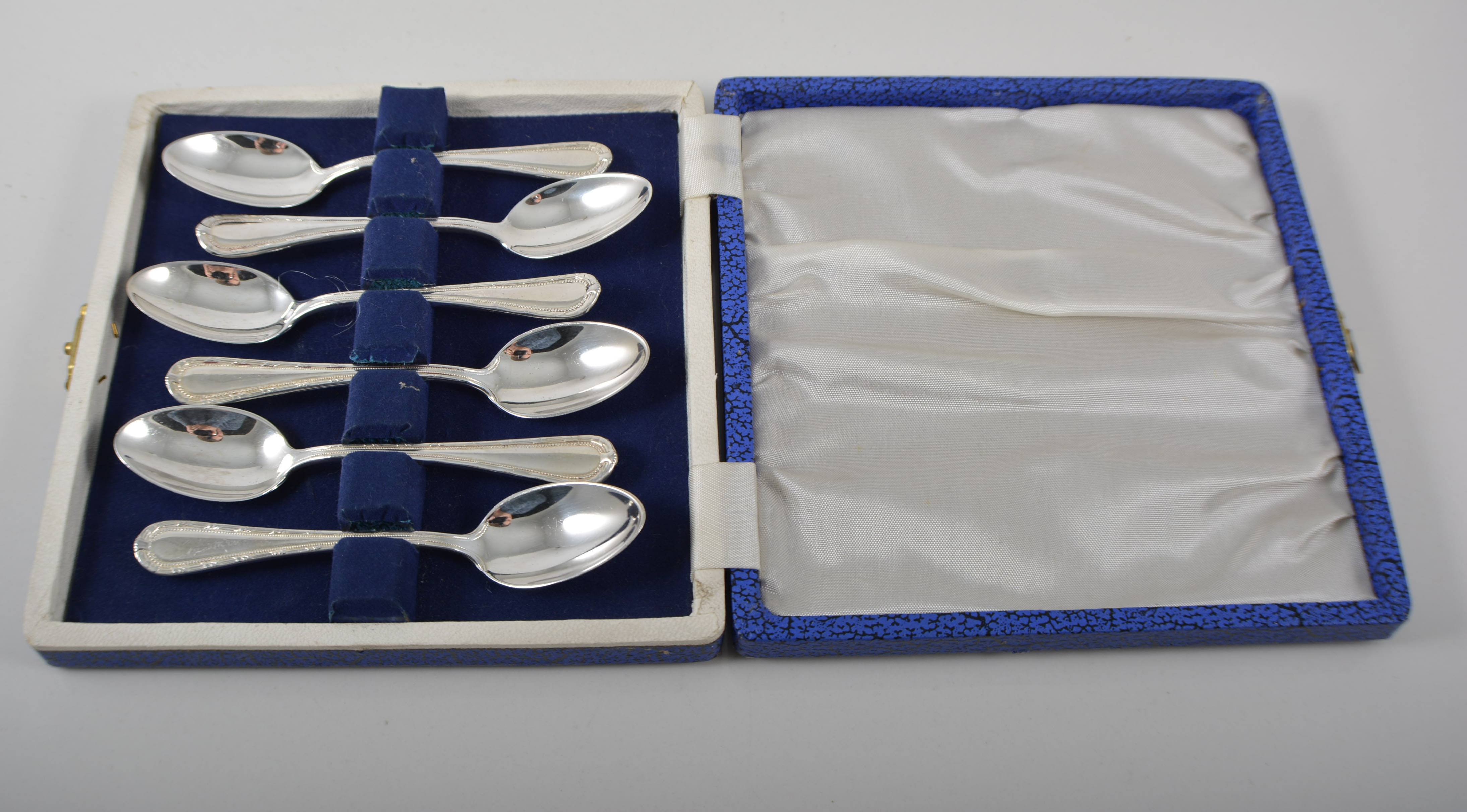 Set of six silver coffee spoons, Deacon & Sons.