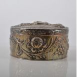 Continental silver circular box, repousee chased with soldiers on horseback, floral border,