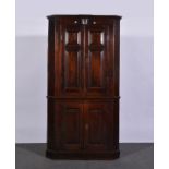 George III oak freestanding corner cupboard, moulded cornice, fielded panelled doors,