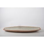 David Leach stoneware dish, ovoid form, oatmeal glaze, incised wave design, impressed seal mark,