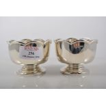 Pair of silver pedestal bowls, shaped rims, G.H.