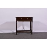 Joined oak side table, 18th Century and later, with a rectangular boarded top, frieze drawer,