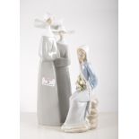 Lladro porcelain model, Girl with Lilies, height 23cm and a Spanish porcelain model of two Nuns,