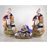 Two Staffordshire pottery models, painted in colours,