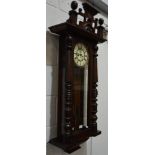 Stained walnut Vienna type wall clock with pediment, half column suppports,