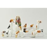 Royal Doulton model of a Retriever HN1028, 15cm and six Doulton models of puppies, (7).