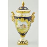 Coalport amphora shape vase with mask head handles, reserves painted with castle by Malcolm Harnett,