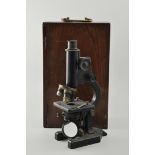Microscope, by Beck, London, in a wooden case, case height 36cm.