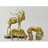 Brass model of a stag, horse models, horse brasses, leather straps.